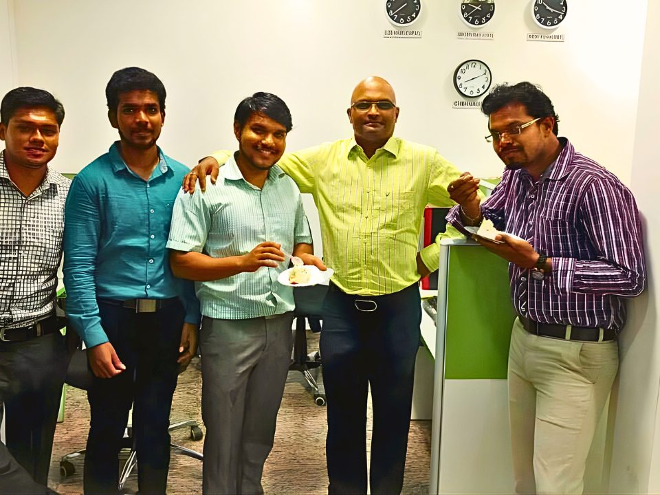 Team celebrating a milestone at the Chennai office, 2014